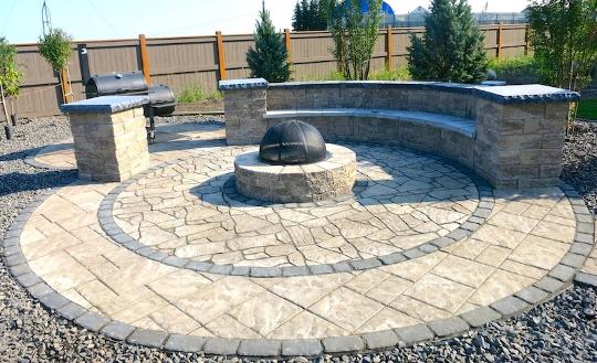 Outdoor Fire Pit with Built in bench seating in Calgary Backyard