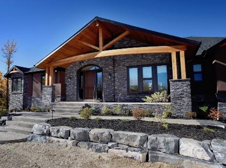Raised garden beds & natural stone for Acreage landscape construction in Calgary