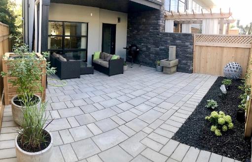 Modern paving stone design & construction in small Calgary backyard