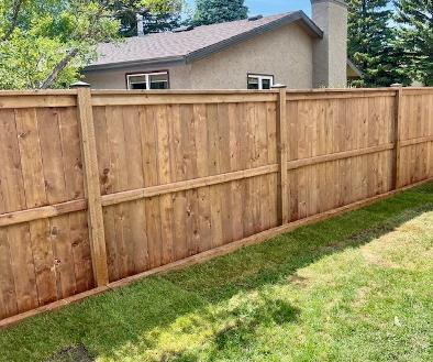Wood Fence built by rundle landscaping in Calgary Backyard