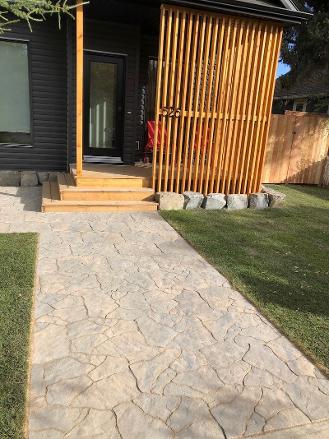 Paving stone walkway construction in Calgary front yard