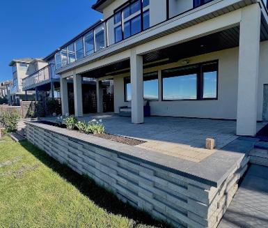 Modern retaining wall construction in Calgary backyard